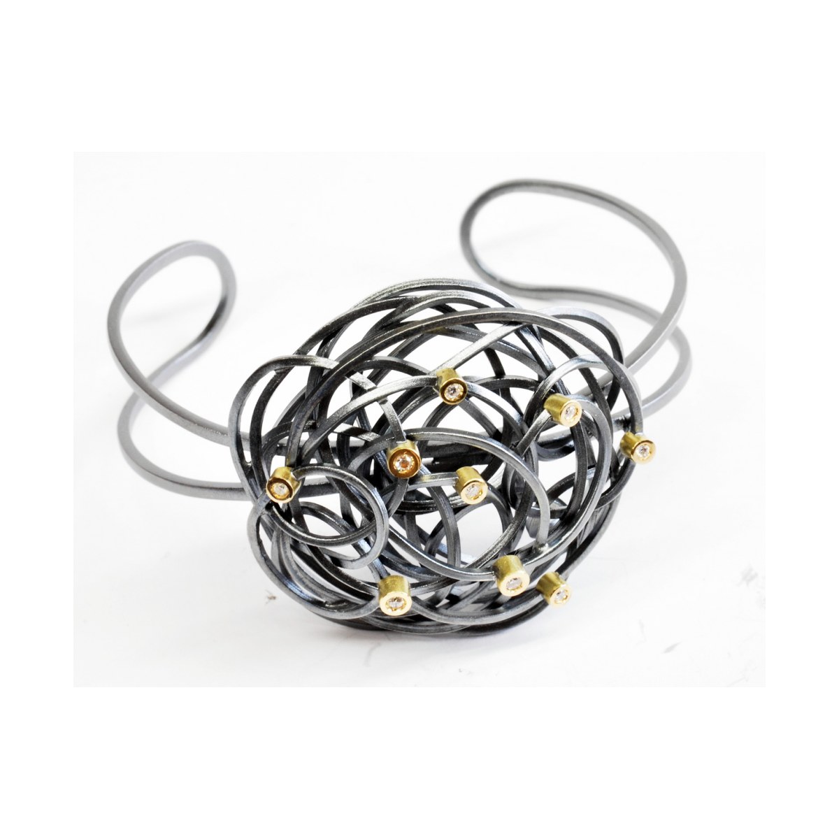 CAOS Bangle; Silver and Gold and diamonds van Arior Barcelona