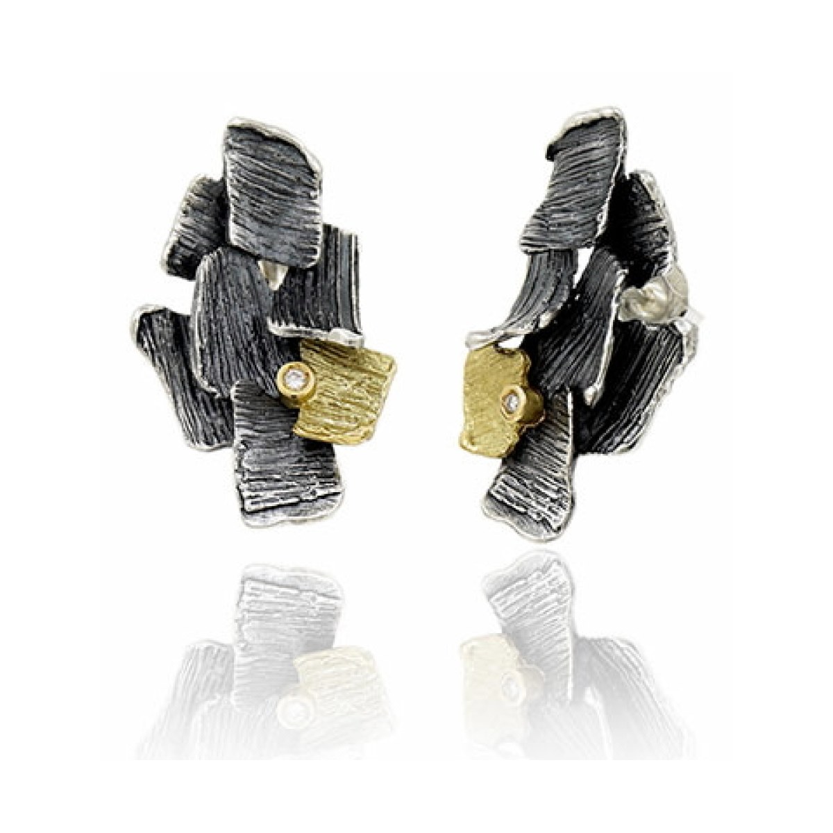 Pendientes summum plata y oro alargados van Arior Barcelona